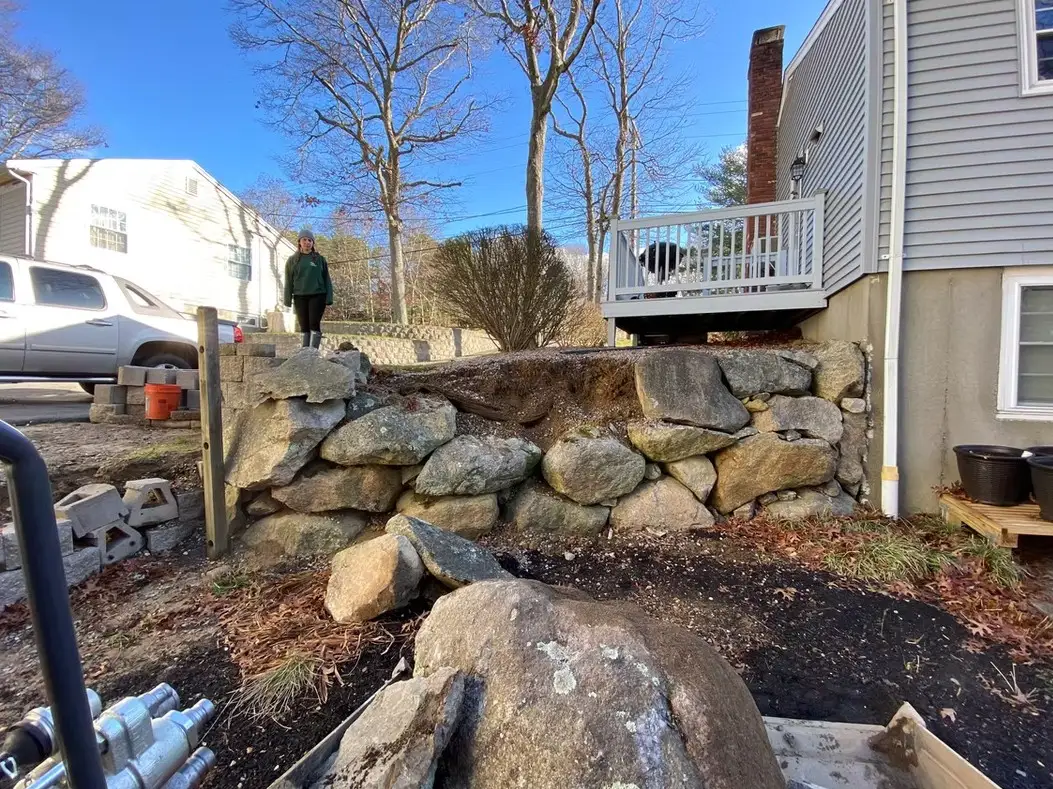 Slope before retaining wall construction